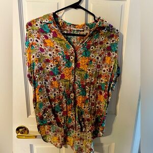 Retro, bright and bold floral print button up. Light weight and breathable.